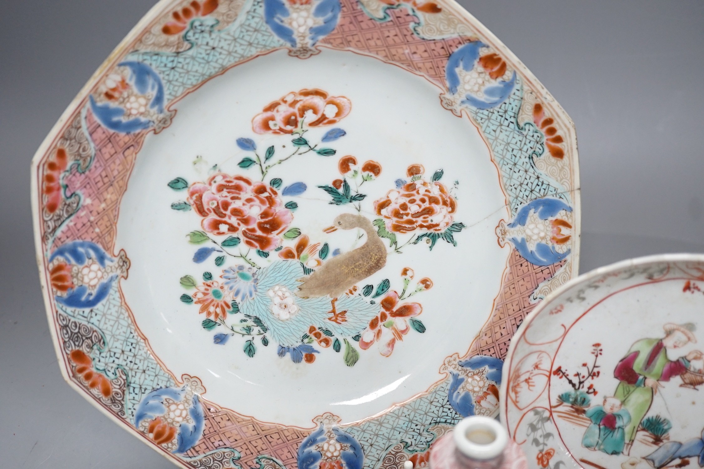 An 18th century Chinese export octagonal dish, a similar saucer and an underglaze blue and red snuff bottle